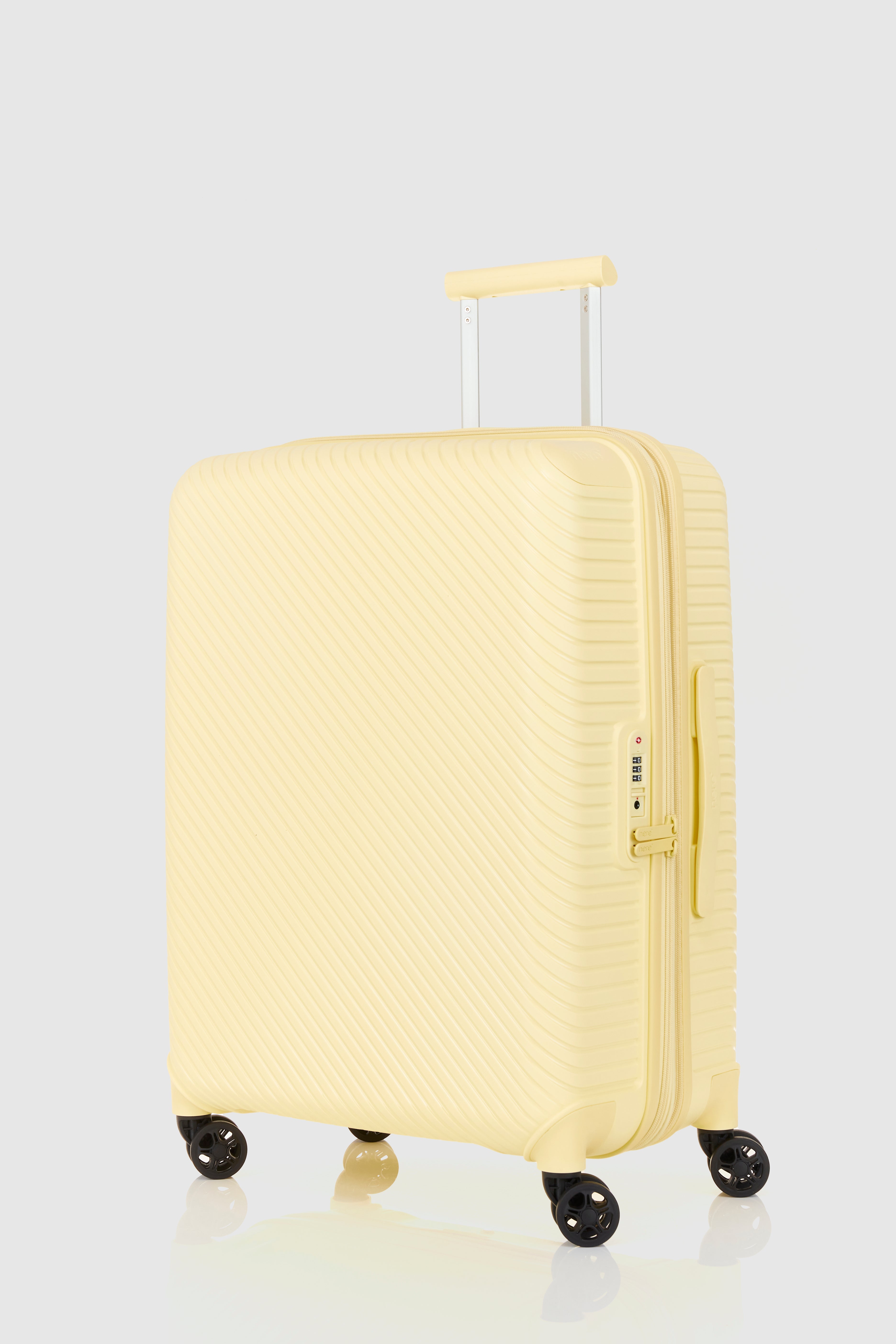 Pastel yellow suitcase on sale