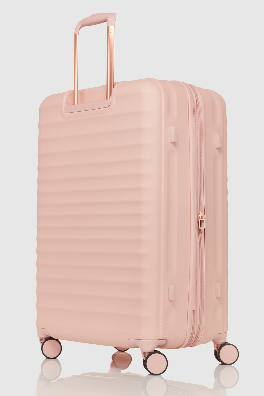 Away shop blush luggage